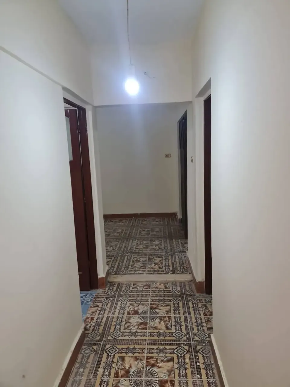 شقةللبيع مساكن الزهراء أمام مجمع المحاكم دول اول علوي90 م