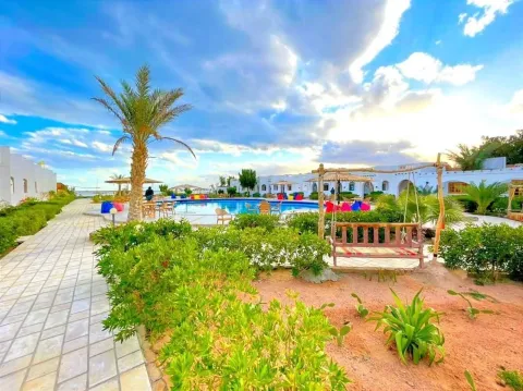 فندق كانيون مميزاتالفندق 🏖️ واحد من أجمل الشواطئ في دهب