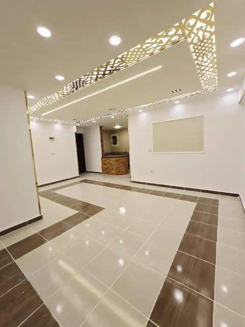 شقه للبيع بشاطئ النخيل واحد 6اكتوبر الاسكندريه العجمي